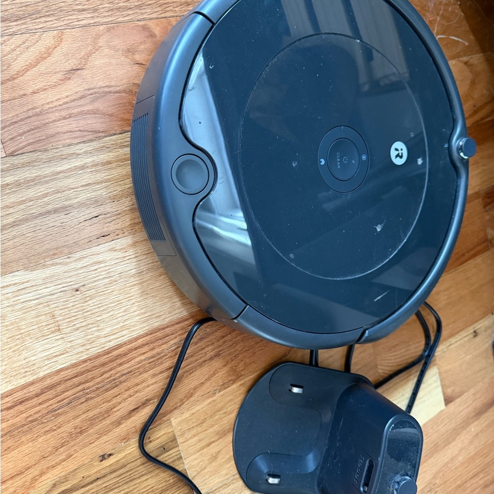 Black Robotic Vacuum Cleaner with Charging Dock